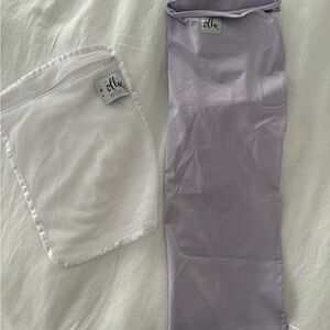 The Ollie World baby swaddle lavender. Like new.